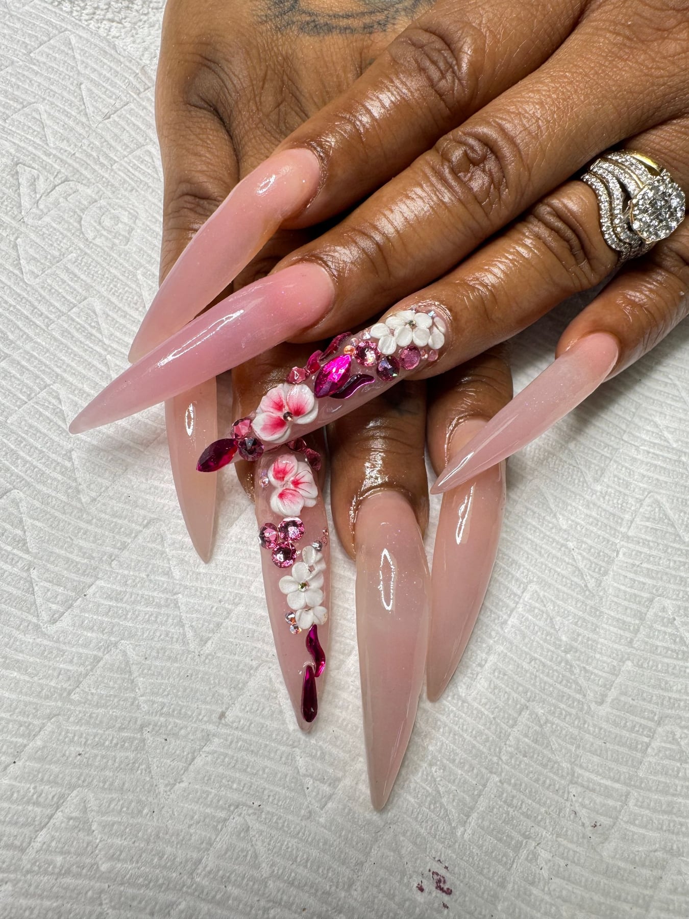 Blush pink nails with floral art